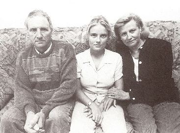 Marimar Blanco con sus padres.